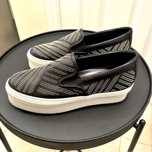 Women’s brand new SALVATORE FERRAGAMO
Leather Studded Accents Sneakers
Size: 10